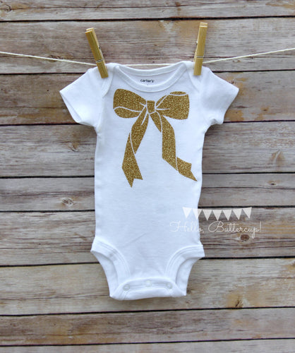 Topped with a bow bodysuit